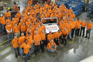 Production workers at KUKA Toledo Production Operations gather around the 500,000th Jeep Wrangler body-in-white built at the four-year-old plant in Ohio. The KTPO operation is part of Chrysler&rsquo;s Toledo Supplier Park, the most productive manufacturing site for cars in North America. (Photo: KUKA Systems) 